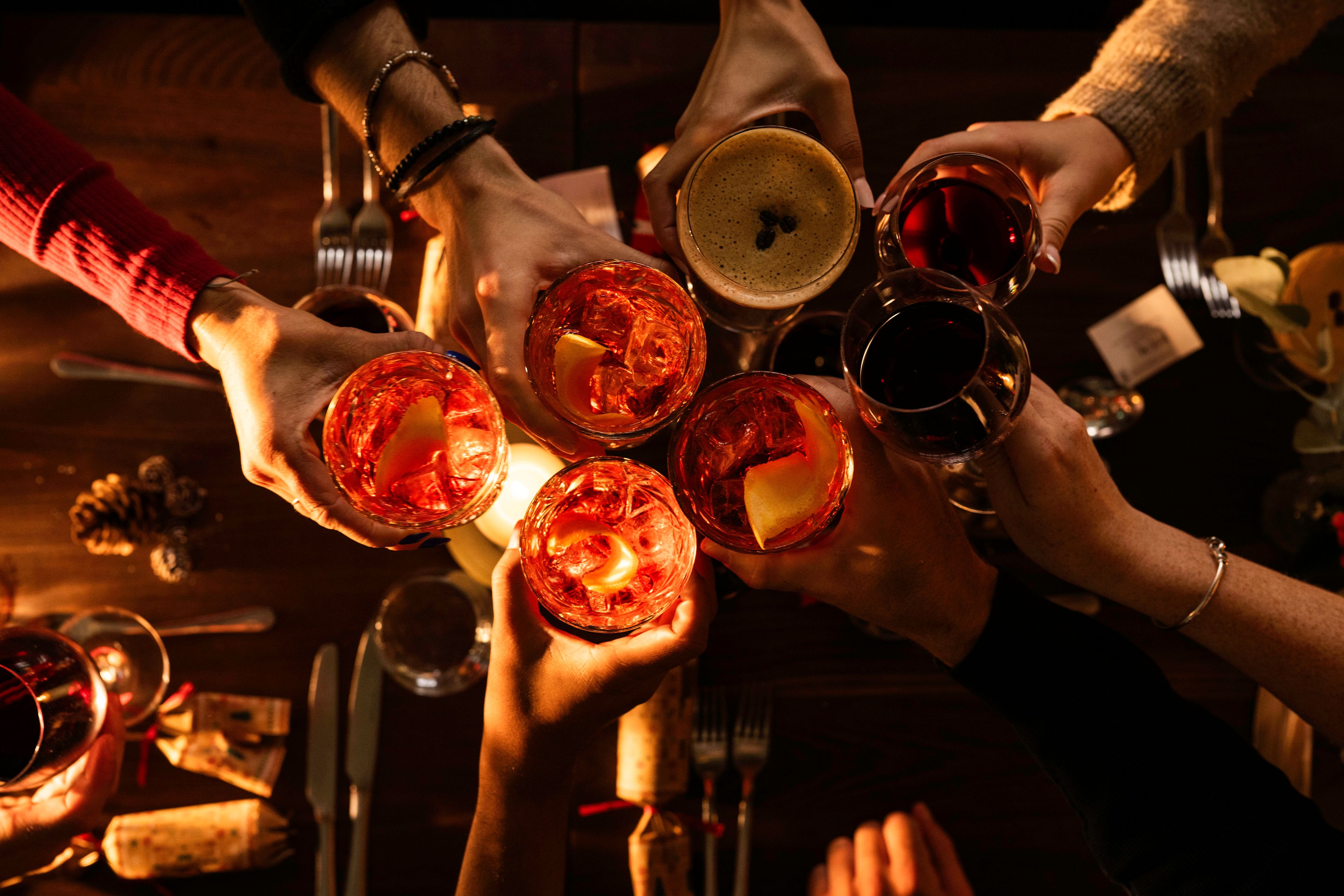 Winter cocktails served in elegant glasses at a cosy London riverside pub.